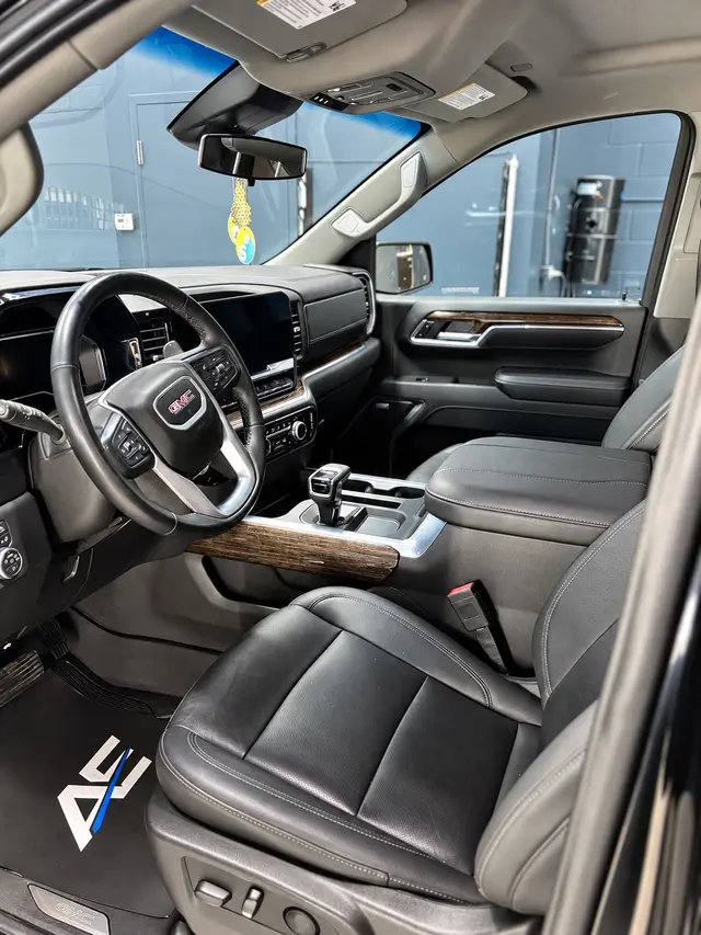 GMC Sierra front seats, dashboard and centre console after Gloss Edit interior detailing