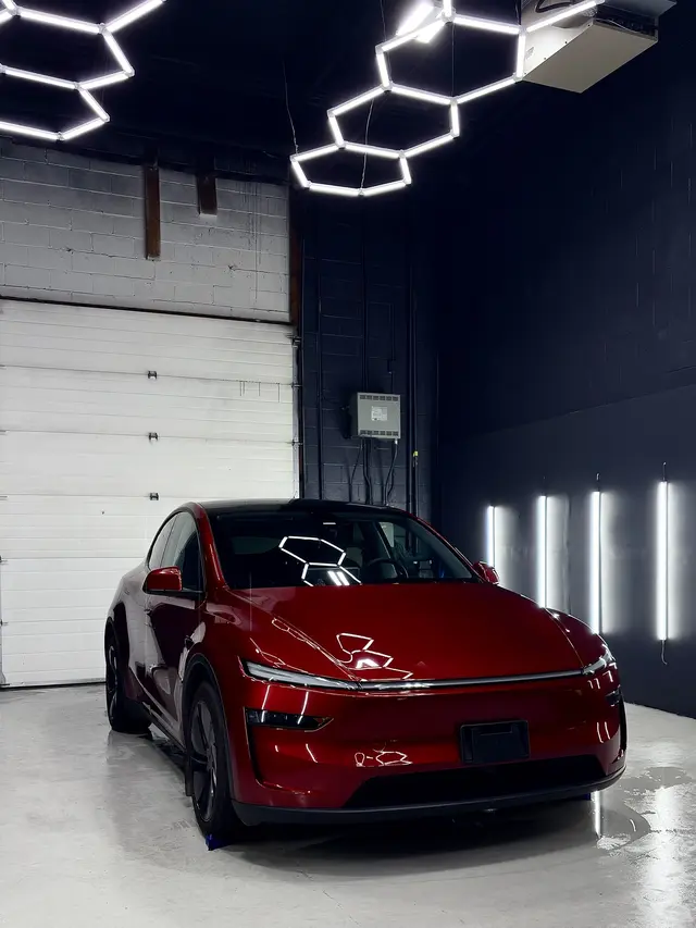 Red Tesla Model Y after Gloss Edit and two-year System X Crystal ceramic coating at The Auto Edit