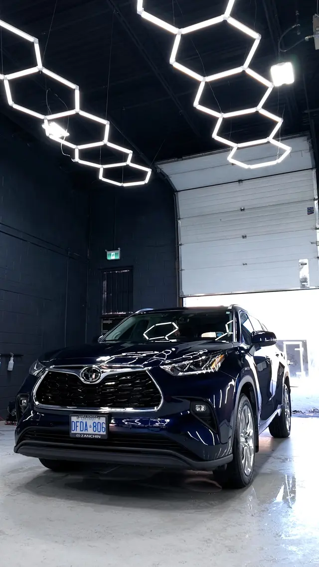 Blue Toyota Highlander after a Gloss Edit detail in The Auto Edit studio